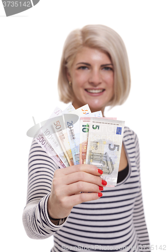 Image of Smiling woman holding a handful of Euro notes