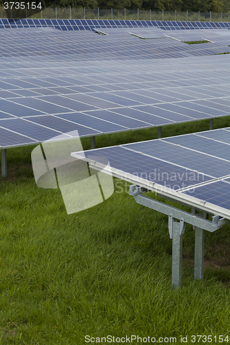 Image of Field with blue siliciom solar cells alternative energy