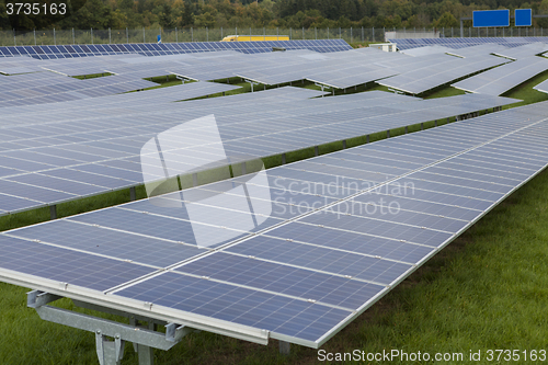 Image of Field with blue siliciom solar cells alternative energy