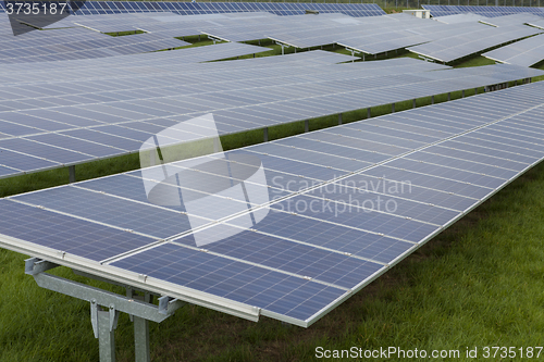 Image of Field with blue siliciom solar cells alternative energy