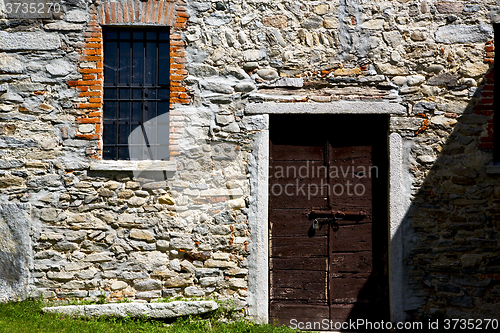 Image of brown door    italy       in  the milano old   window closed bri