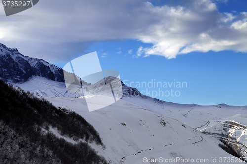 Image of Winter mountains at sun evening