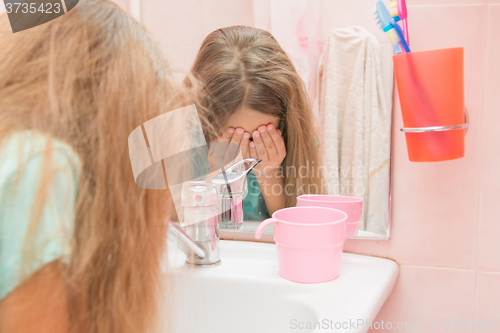 Image of Child eye wash water in the bathroom