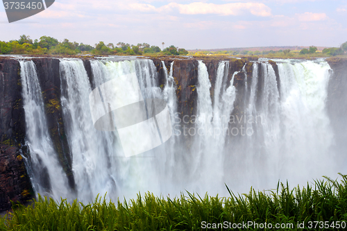 Image of The Victoria falls with mist from water