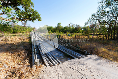 Image of wooden bridge over Okavango swamps