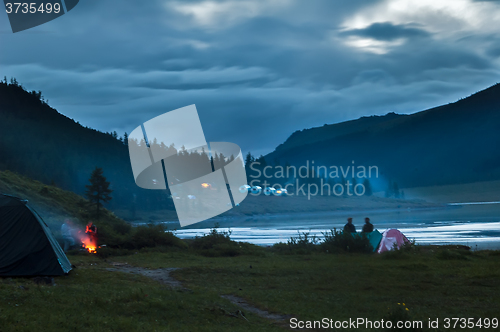 Image of People on spending night on Akkem lake. Russia