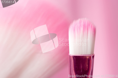 Image of pink professional cosmetic brush 