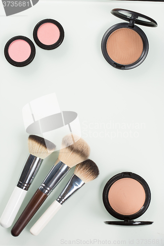 Image of Set of professional cosmetic: make-up brushes, shadows, Front part.