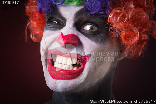 Image of crazy clown a terrible death