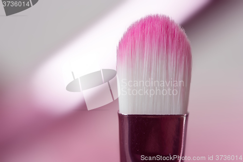 Image of pink professional cosmetic brush 