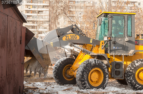 Image of Tractor on building demolition