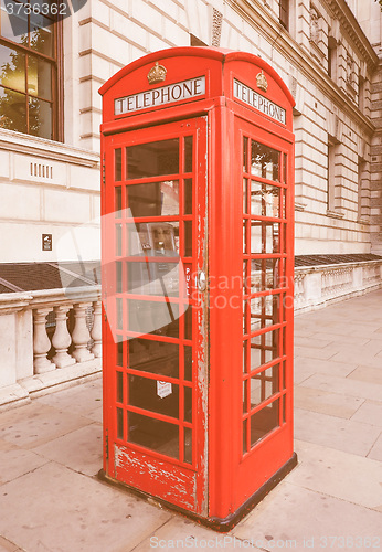 Image of Retro looking Red phone box in London