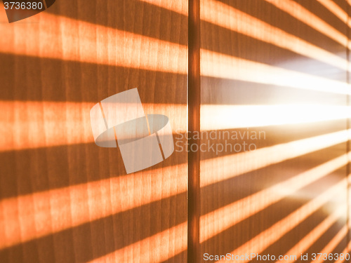 Image of  Sunlight through shutter vintage