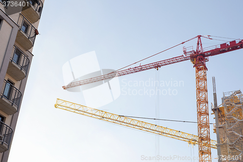 Image of construction site, building and cranes