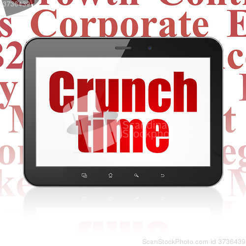 Image of Business concept: Tablet Computer with Crunch Time on display
