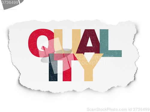 Image of Advertising concept: Quality on Torn Paper background