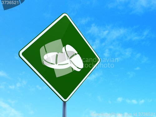 Image of Medicine concept: Pills on road sign background