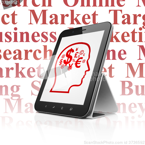 Image of Marketing concept: Tablet Computer with Head With Finance Symbol on display