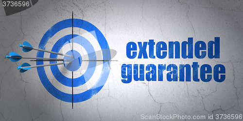 Image of Insurance concept: target and Extended Guarantee on wall background