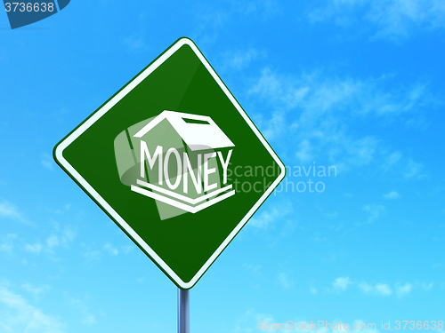 Image of Banking concept: Money Box on road sign background