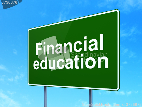 Image of Education concept: Financial Education on road sign background