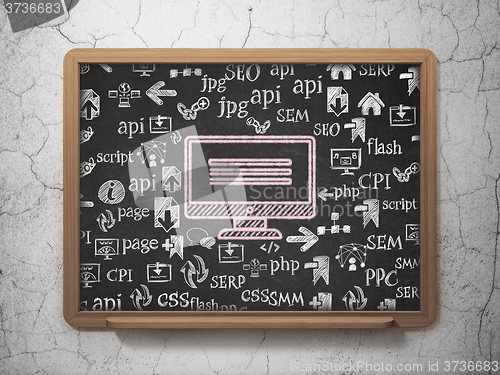 Image of Web design concept: Monitor on School Board background