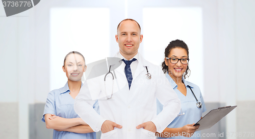 Image of group of happy doctors at hospital