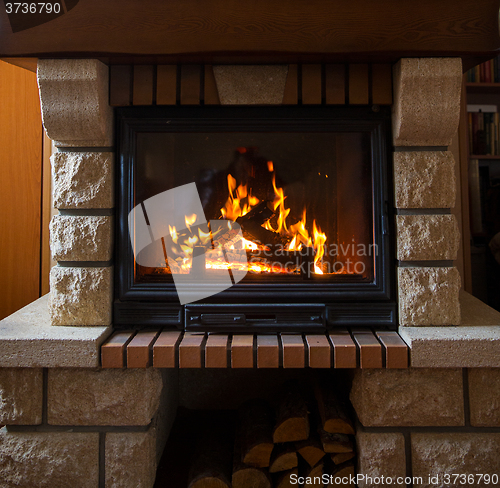 Image of close up of burning fireplace at home