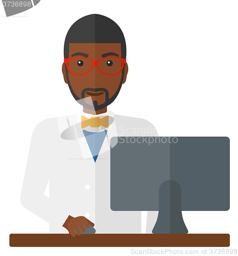 Image of Pharmacist standing at counter.