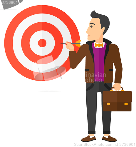 Image of Businessman with target board.