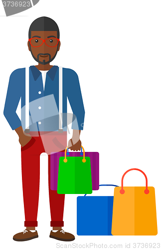 Image of Buyer with shopping bags.