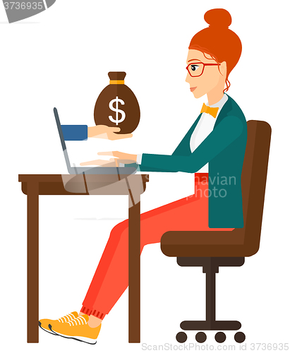 Image of Business woman working in office.