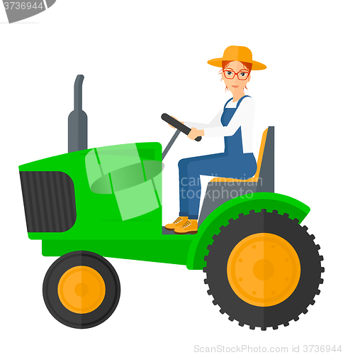 Image of Farmer driving tractor.