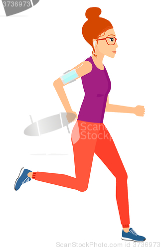 Image of Woman jogging with earphones and smartphone.