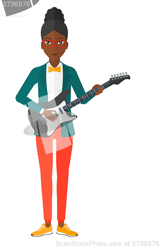 Image of Musician playing electric guitar.