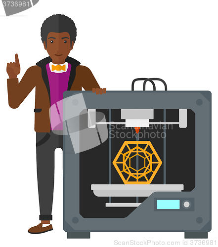 Image of Man with three D printer.