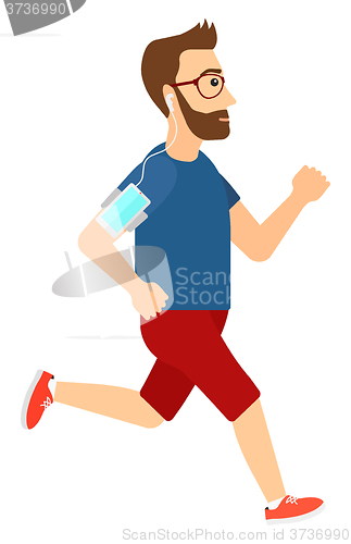 Image of Man jogging with earphones and smartphone.