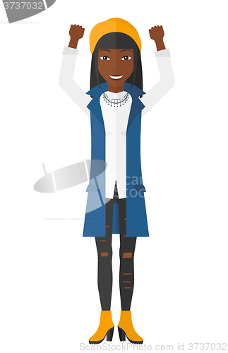 Image of Woman with raised hands up.