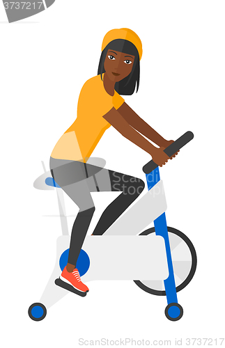 Image of Woman doing cycling exercise.