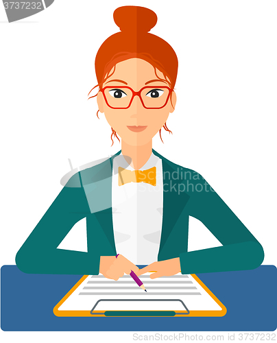 Image of Woman signing contract.