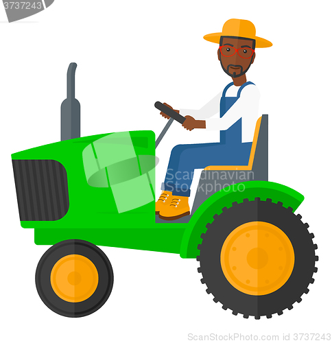 Image of Farmer driving tractor.