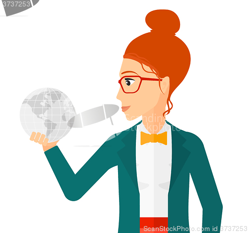 Image of Woman holding globe.
