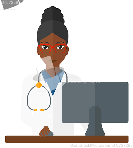 Image of Pharmacist standing at counter.