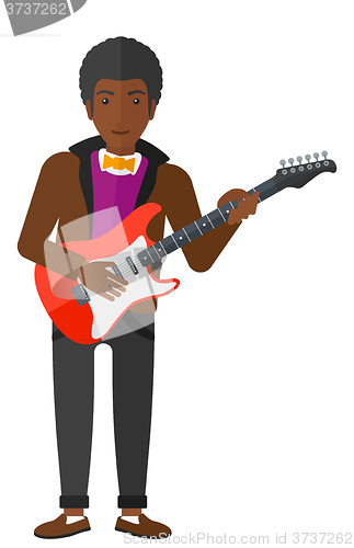 Image of Musician playing electric guitar.