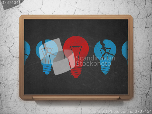 Image of Business concept: light bulb icon on School Board background