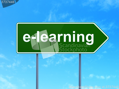 Image of Studying concept: E-learning on road sign background
