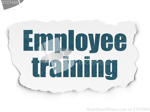 Image of Studying concept: Employee Training on Torn Paper background