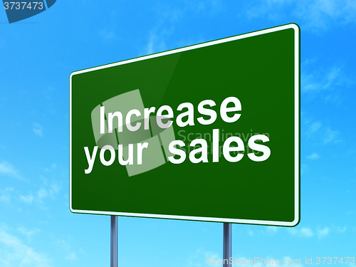 Image of Business concept: Increase Your  Sales on road sign background