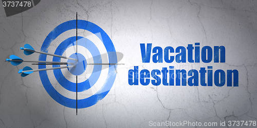 Image of Tourism concept: target and Vacation Destination on wall background