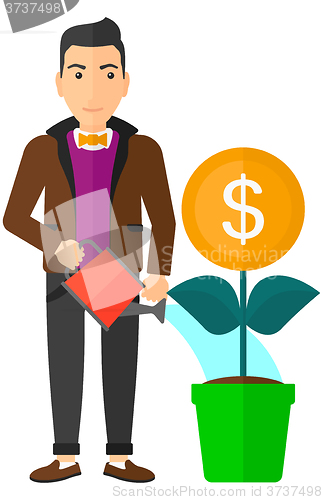 Image of Man watering money flower.